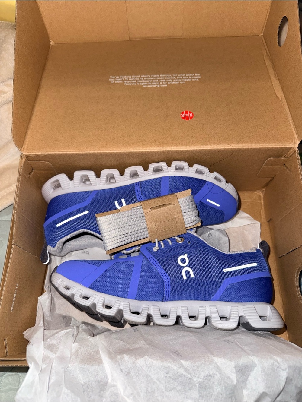 On Running Blue and White Cloud monster Sneakers
